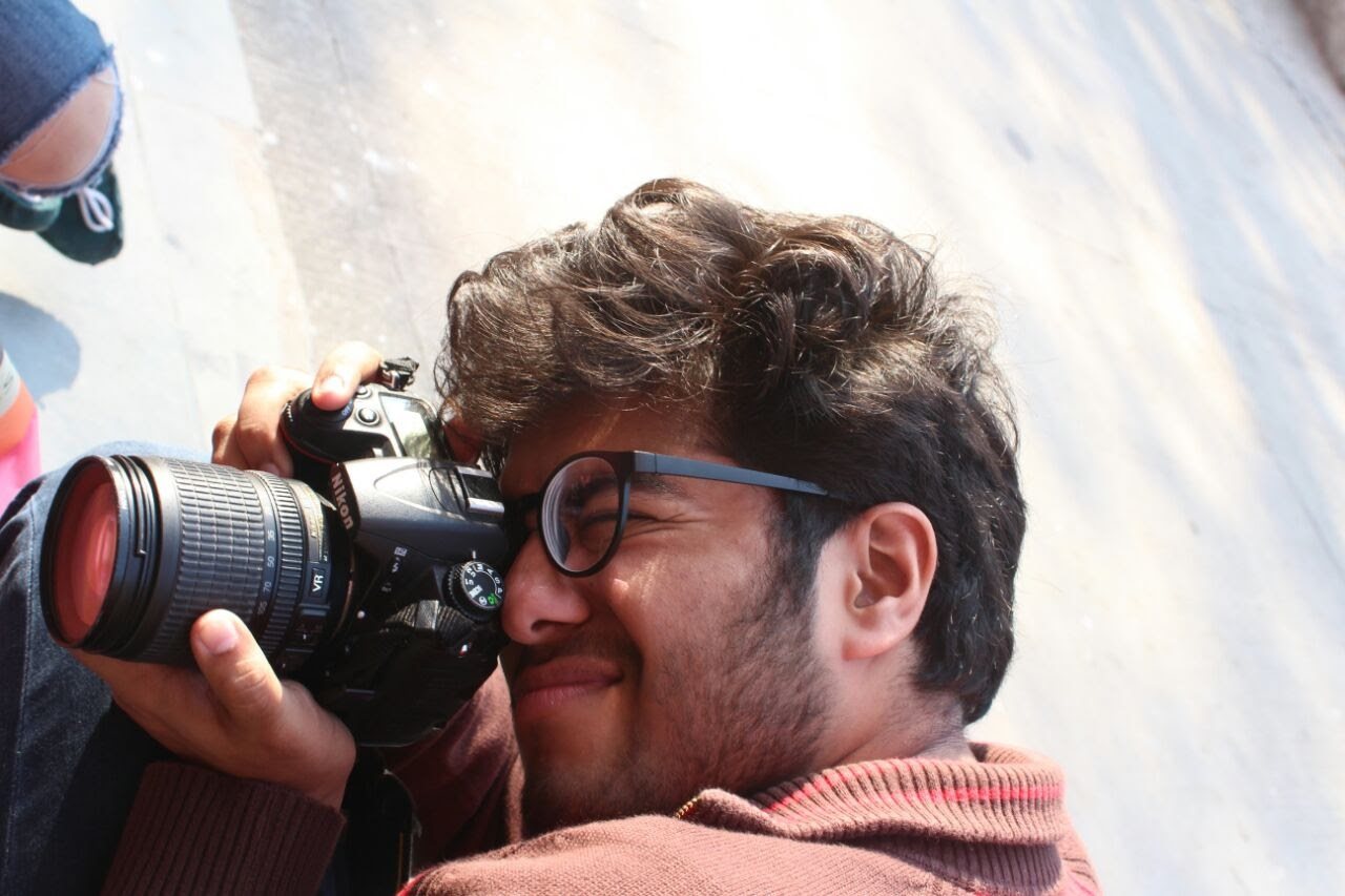 Behind the lens, shooting on a Nikon